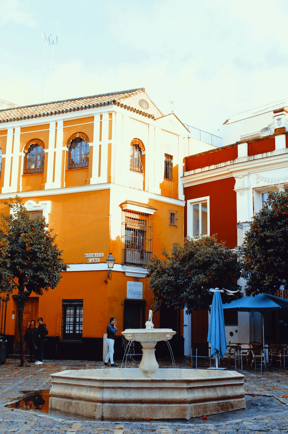 a fountain in front of a building