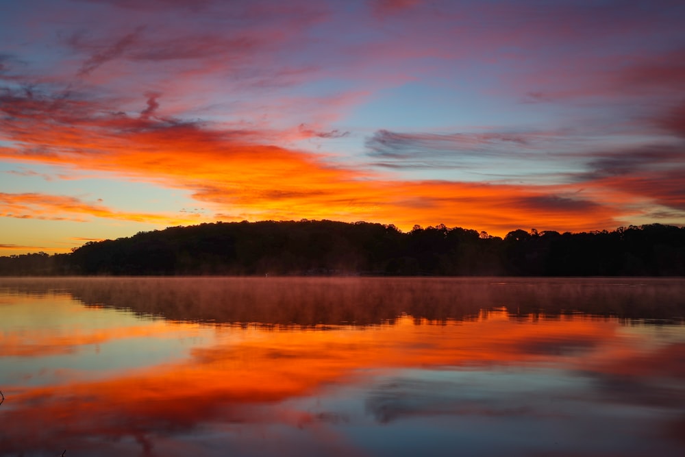 a sunset over a lake