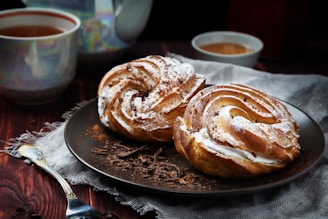 a plate of cinnamon rolls