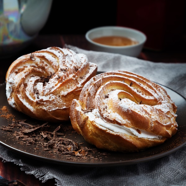 a plate of cinnamon rolls