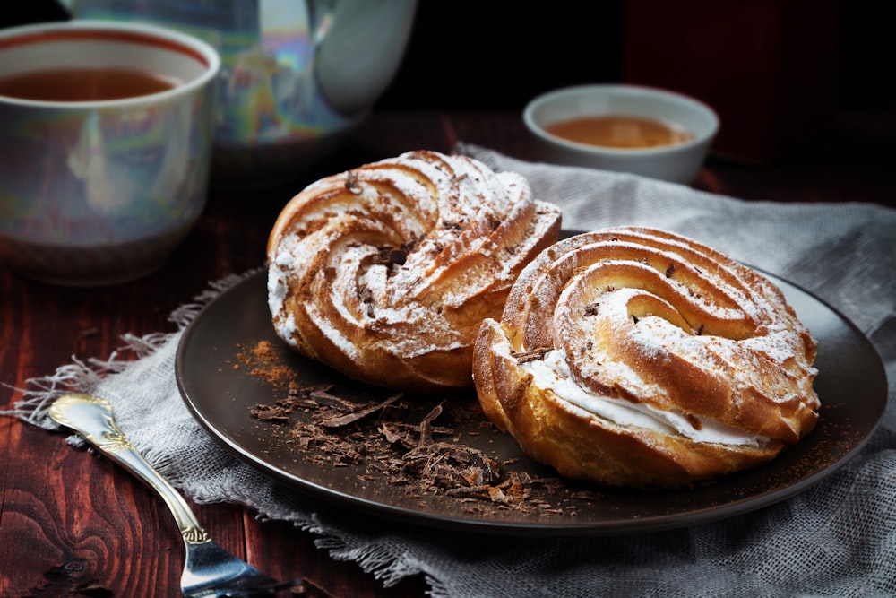 a plate of cinnamon rolls