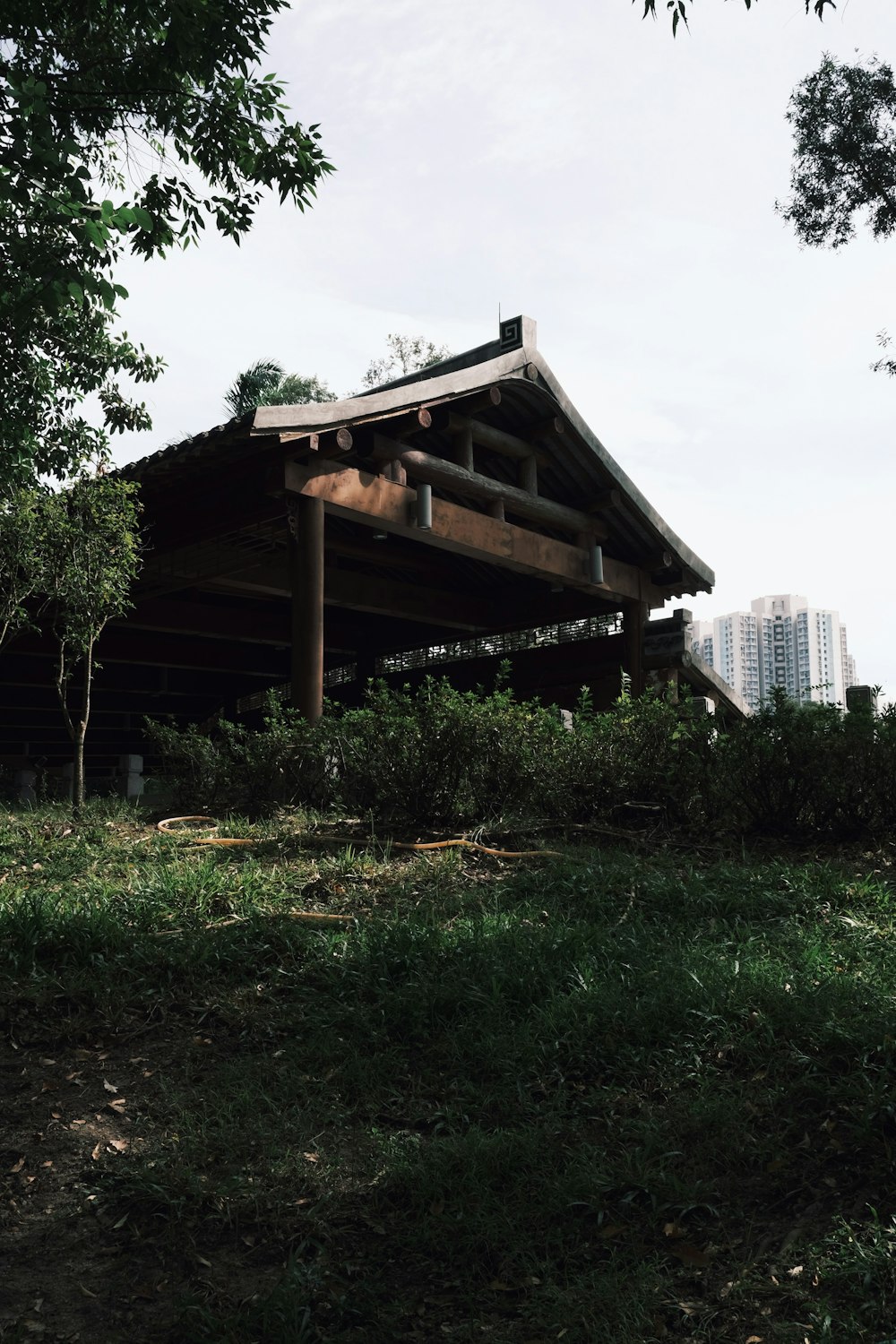 a wooden building with a roof