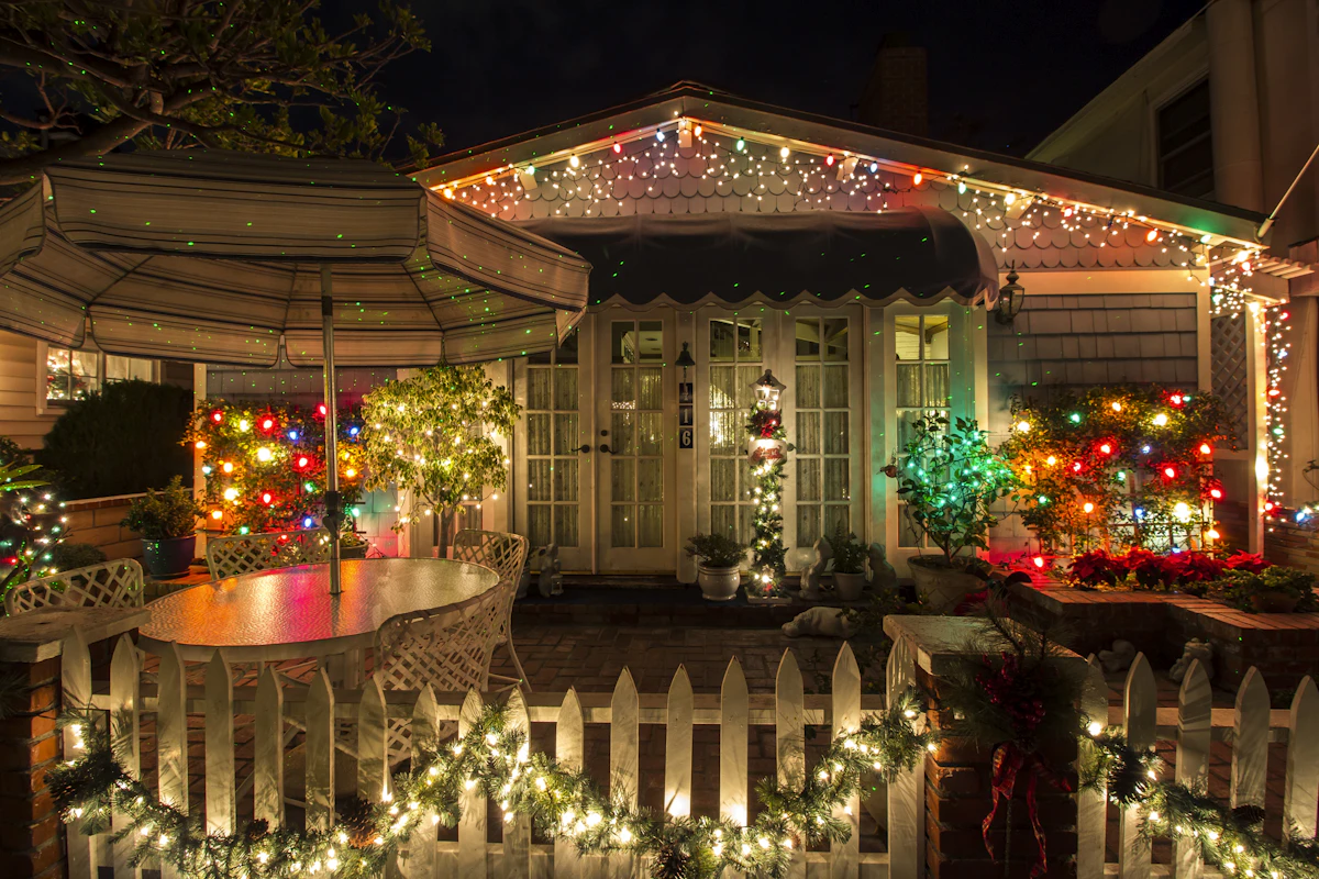 House fully outlined in classic warm white Christmas lights