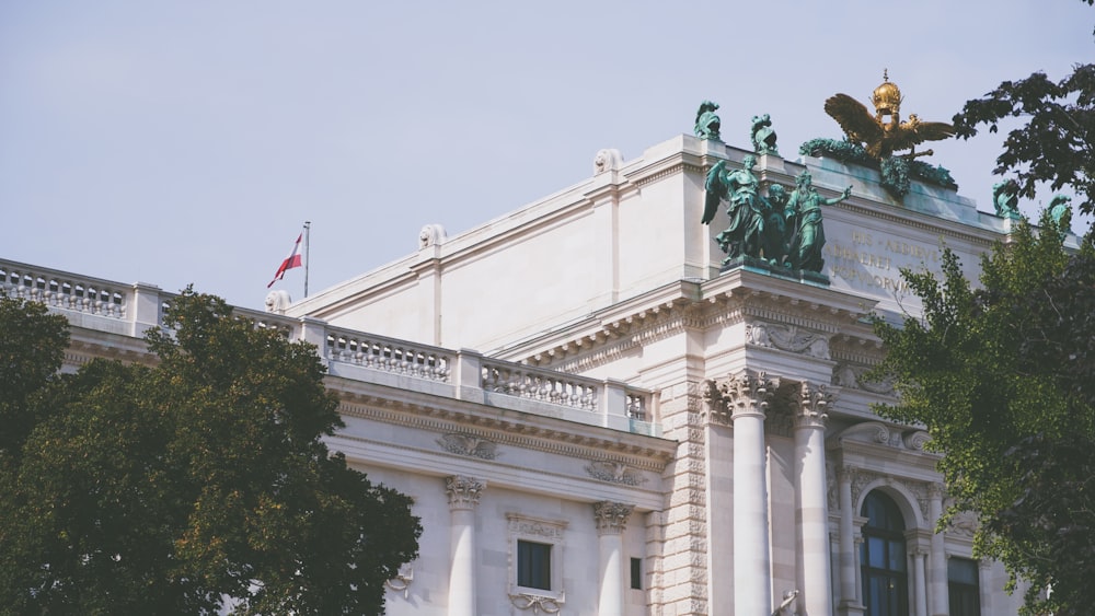 a building with columns and statues