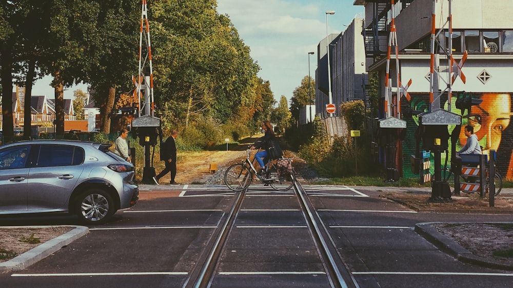 a person riding a bicycle on a street