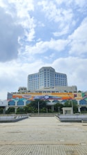 a large building with a sign in front of it