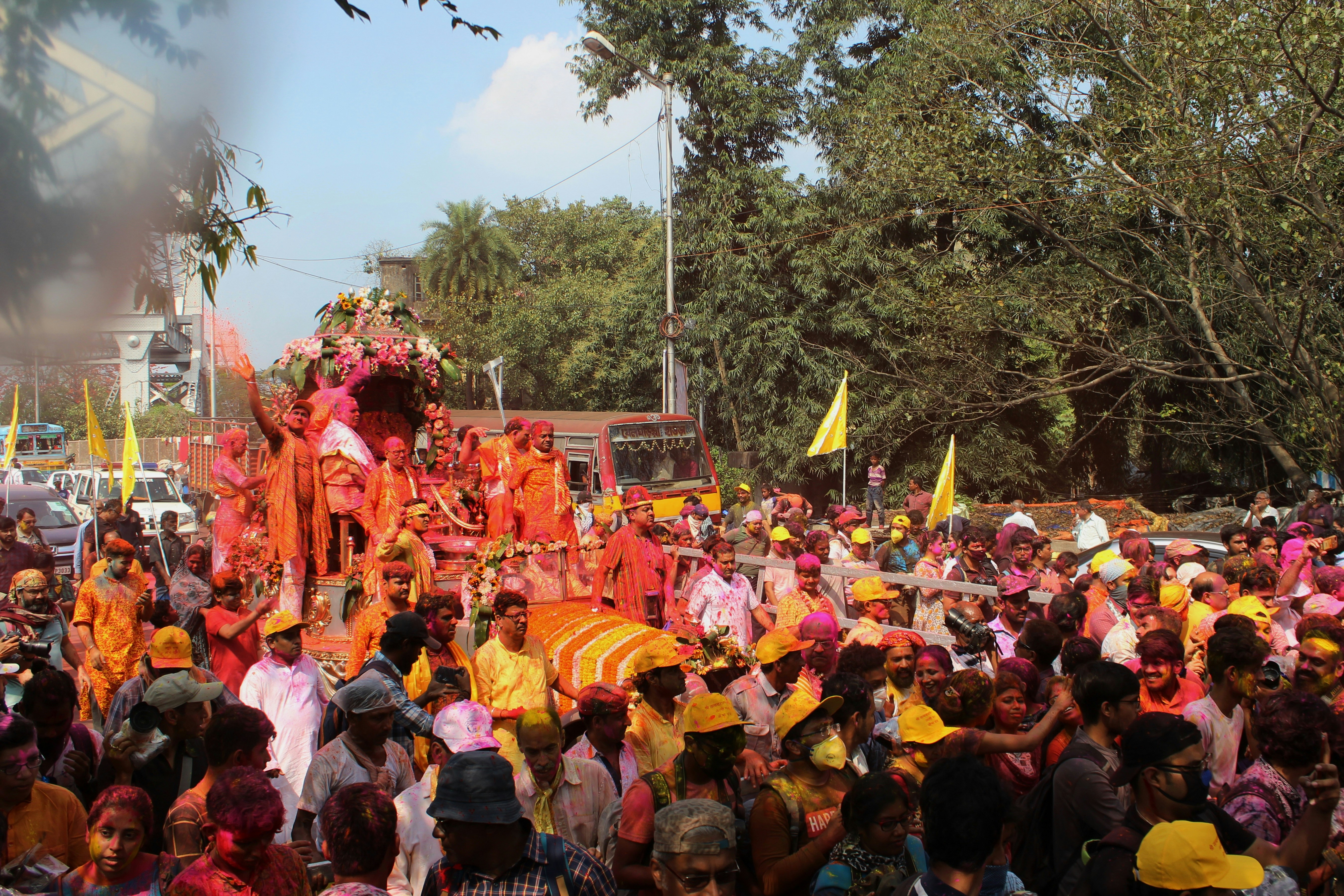 a crowd of people in a street, 