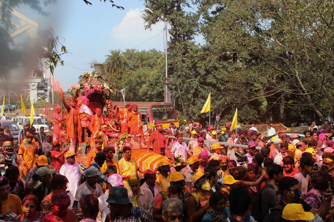 a crowd of people in a street,