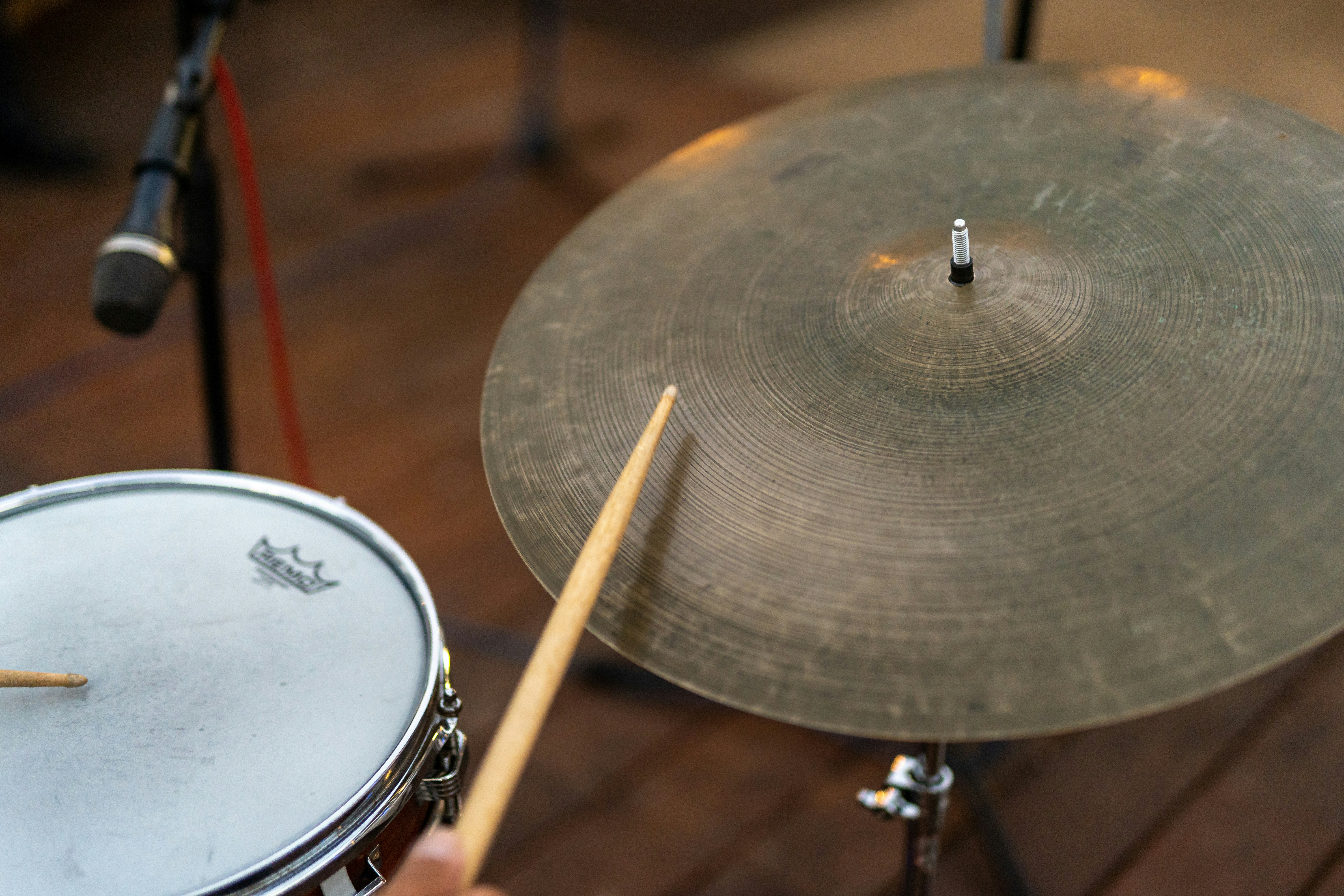 a drum set on a wood floor