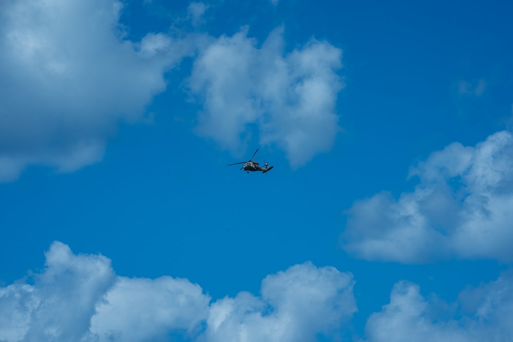 a helicopter flying in the sky