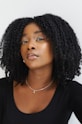 a woman with curly hair