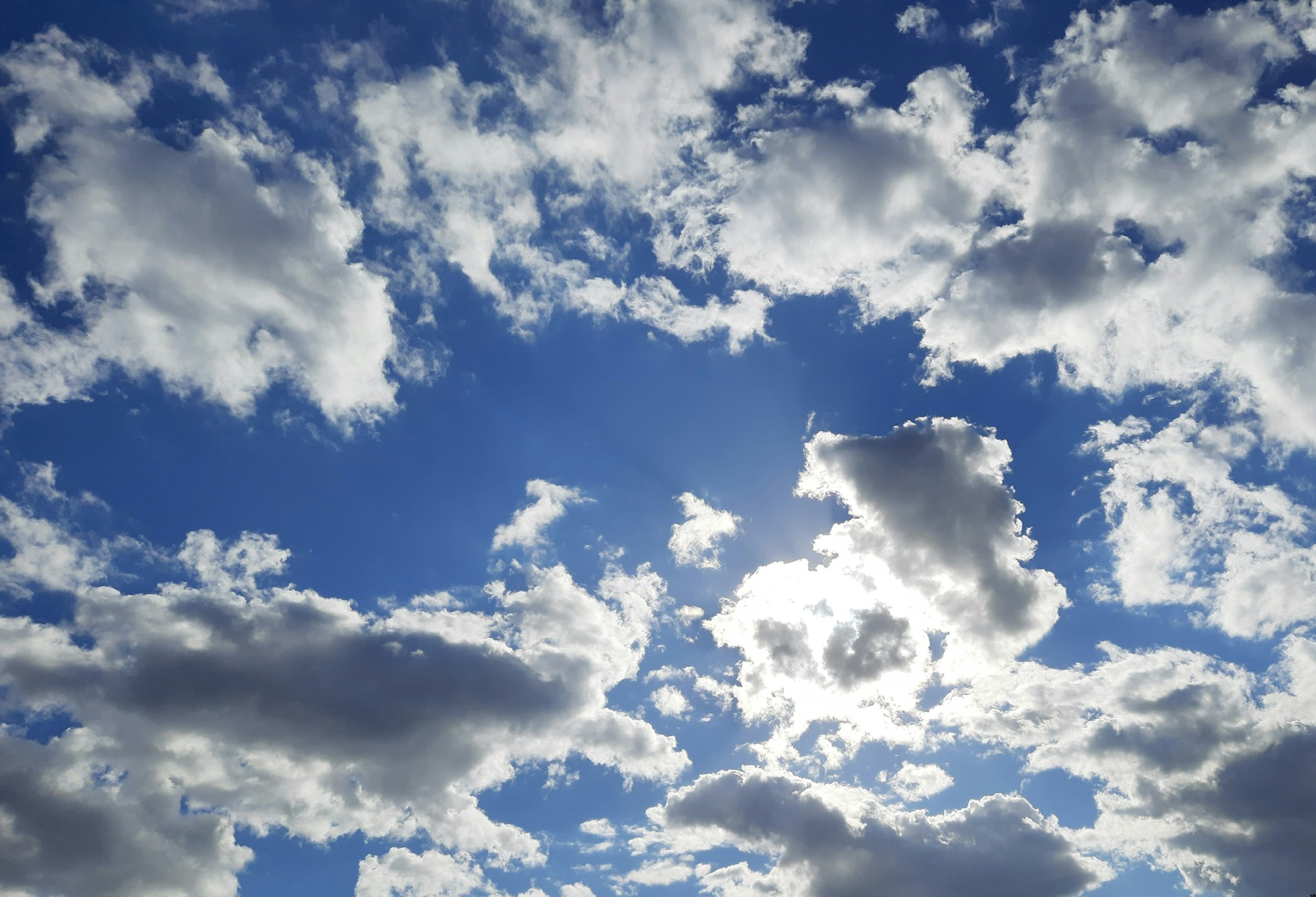 a blue sky with white clouds