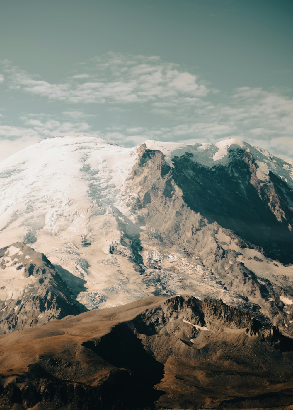 a mountain range with snow