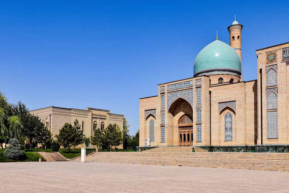 a large building with a green dome