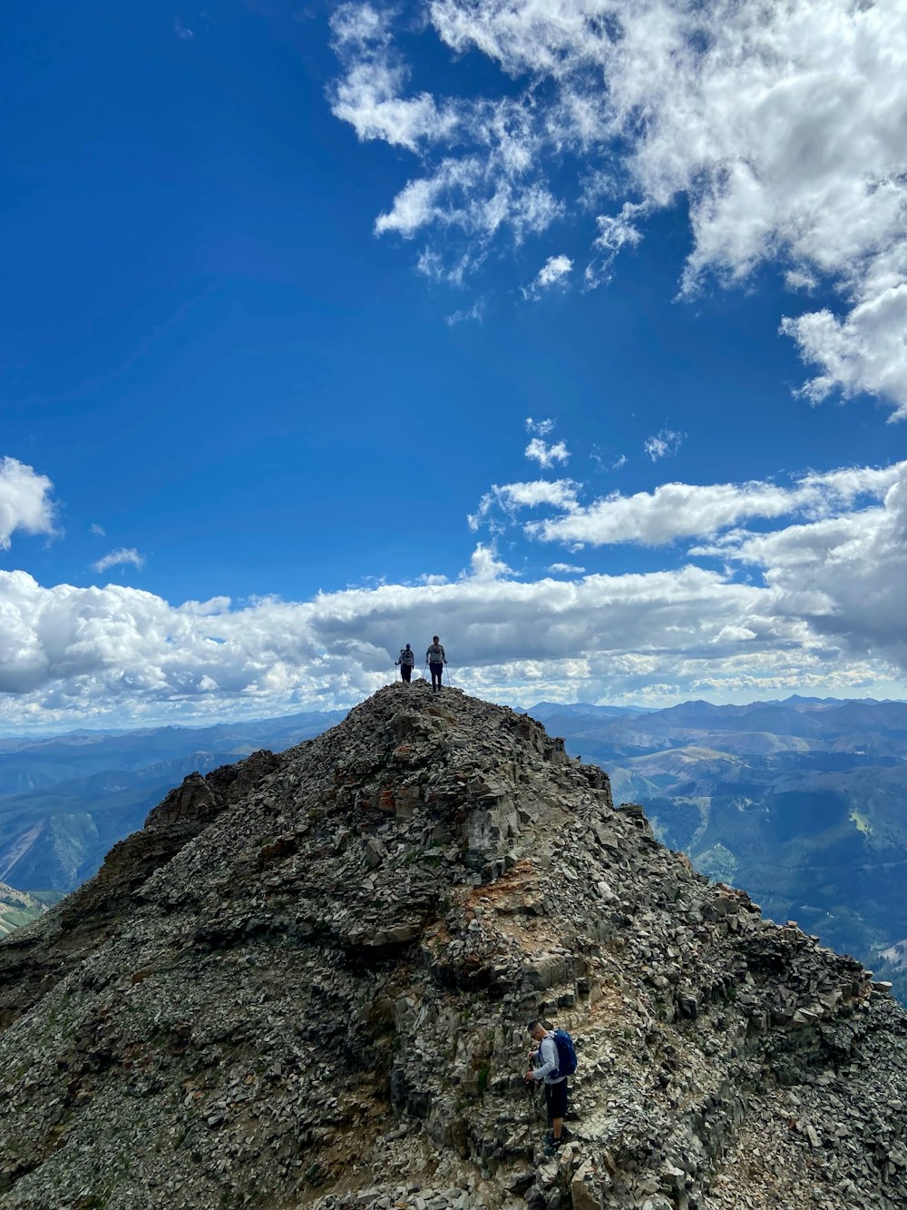 a group of people on a mountain