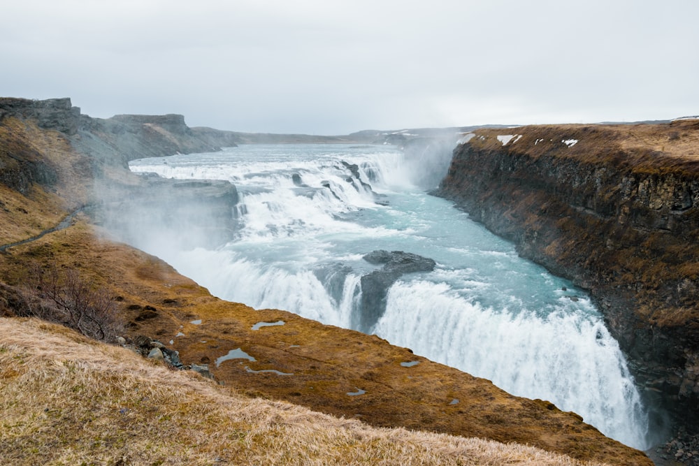 a waterfall in a canyon