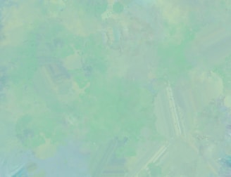 A serene teal and spring green abstract background with soft waves evoking calm and balance.