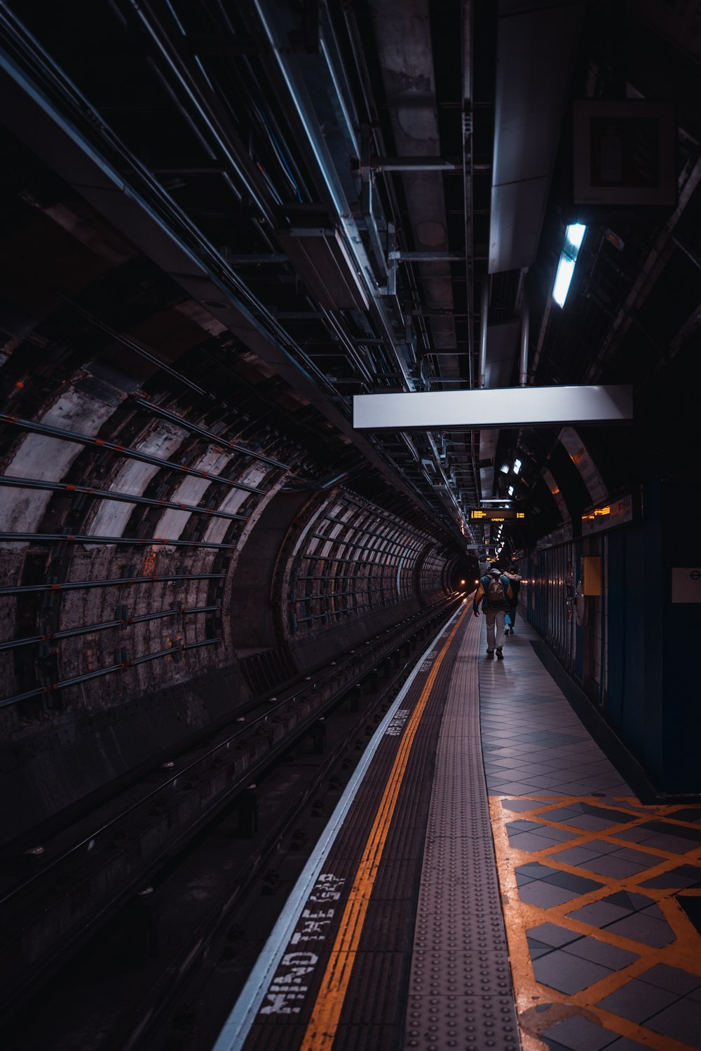 a person walking on a train platform