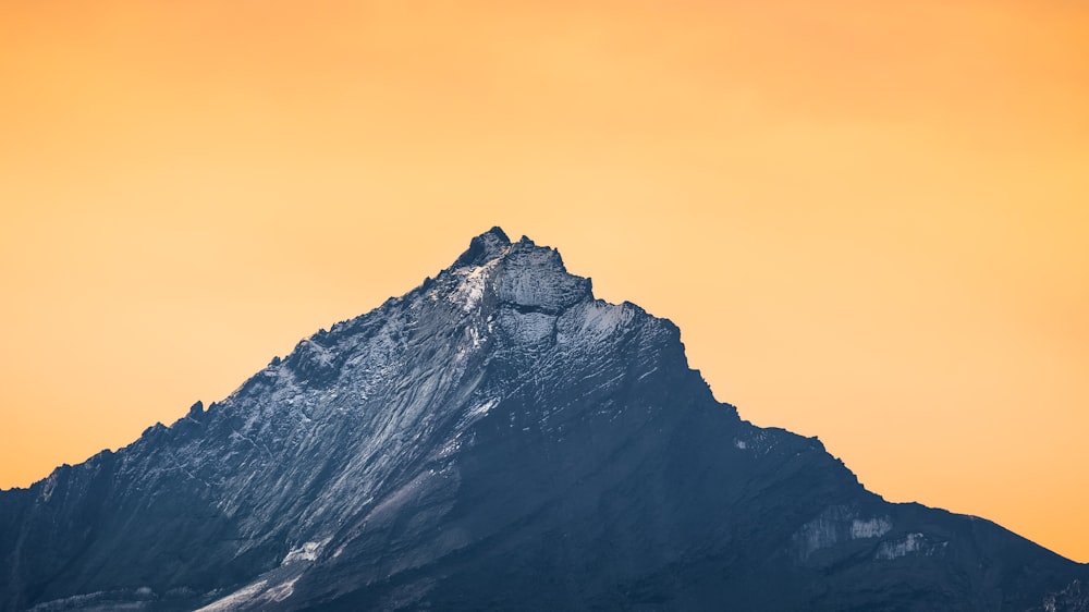 a mountain with snow