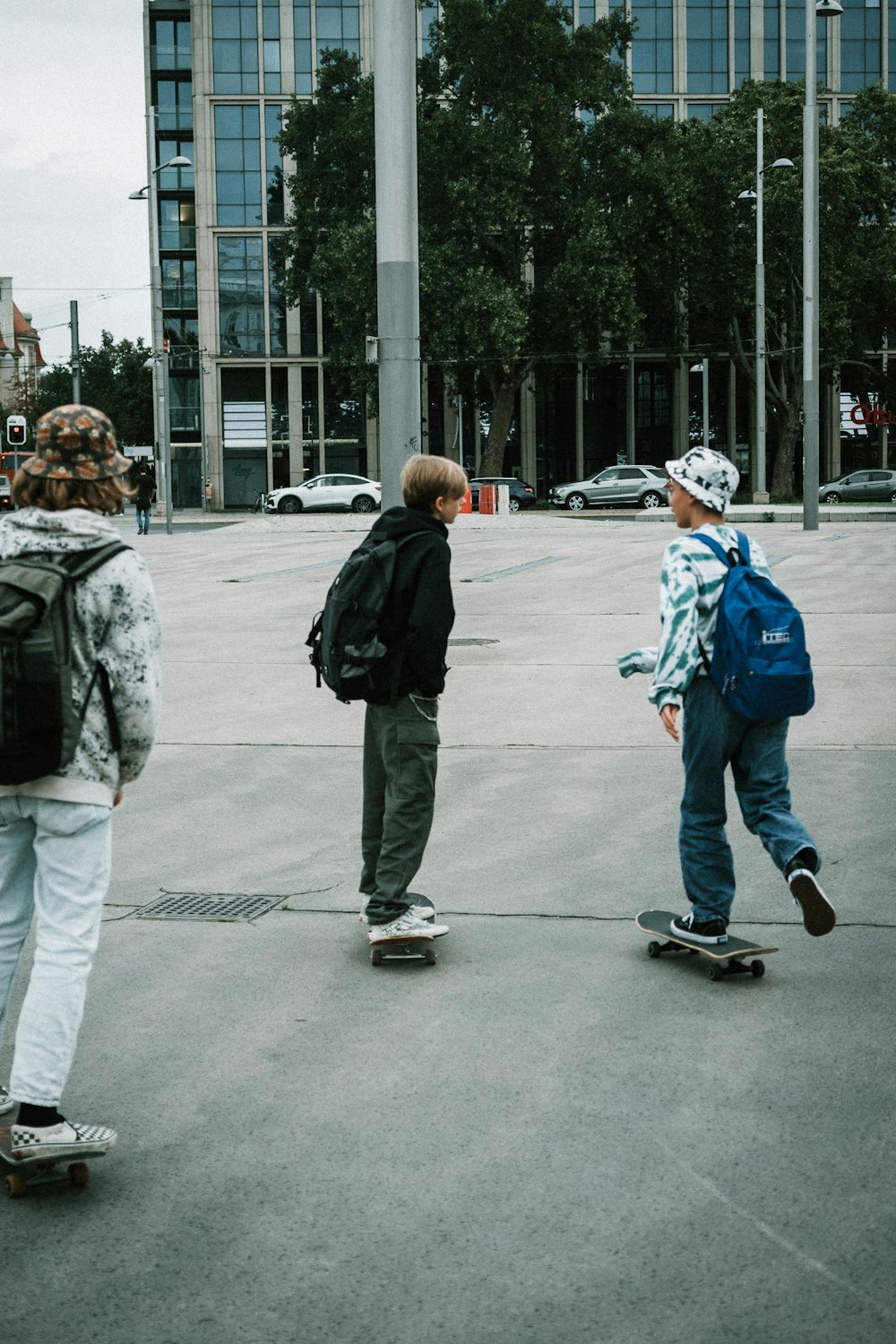 a group of people ride skateboards