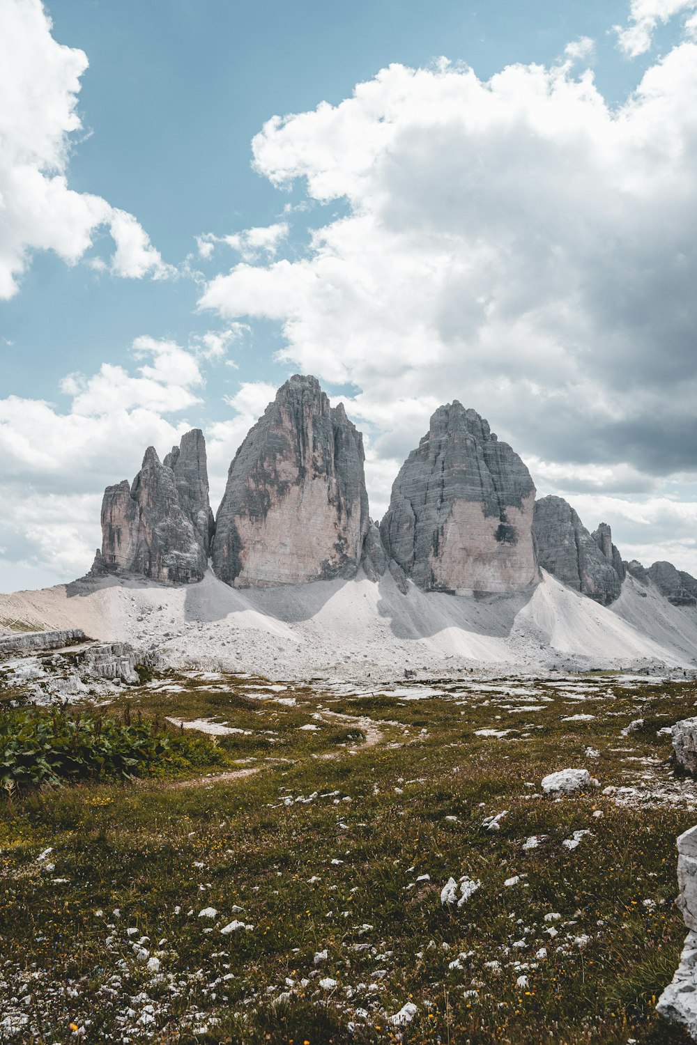 a rocky mountain with snow