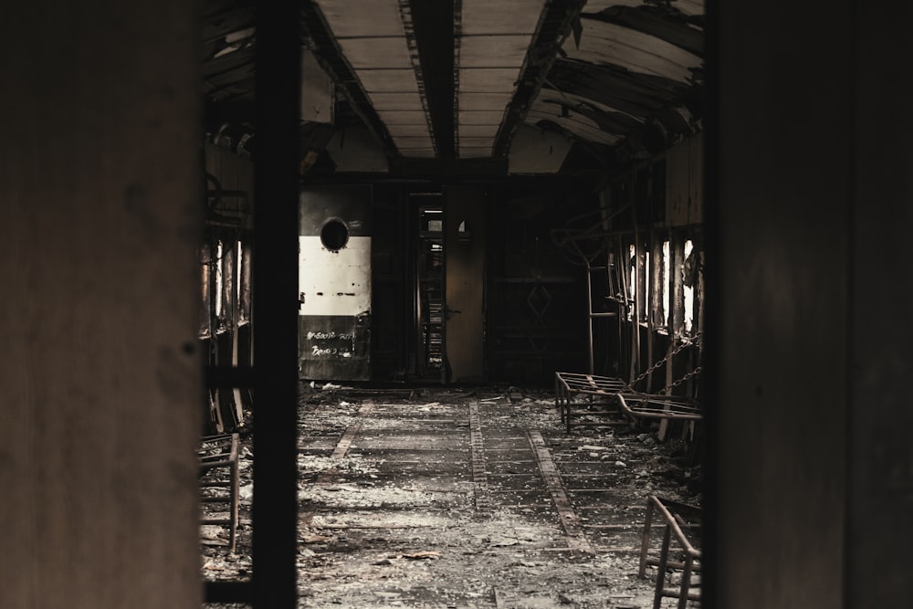 a hallway with chairs and tables