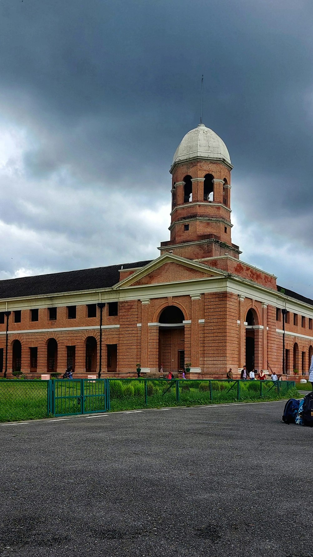 a large brick building with a domed roof