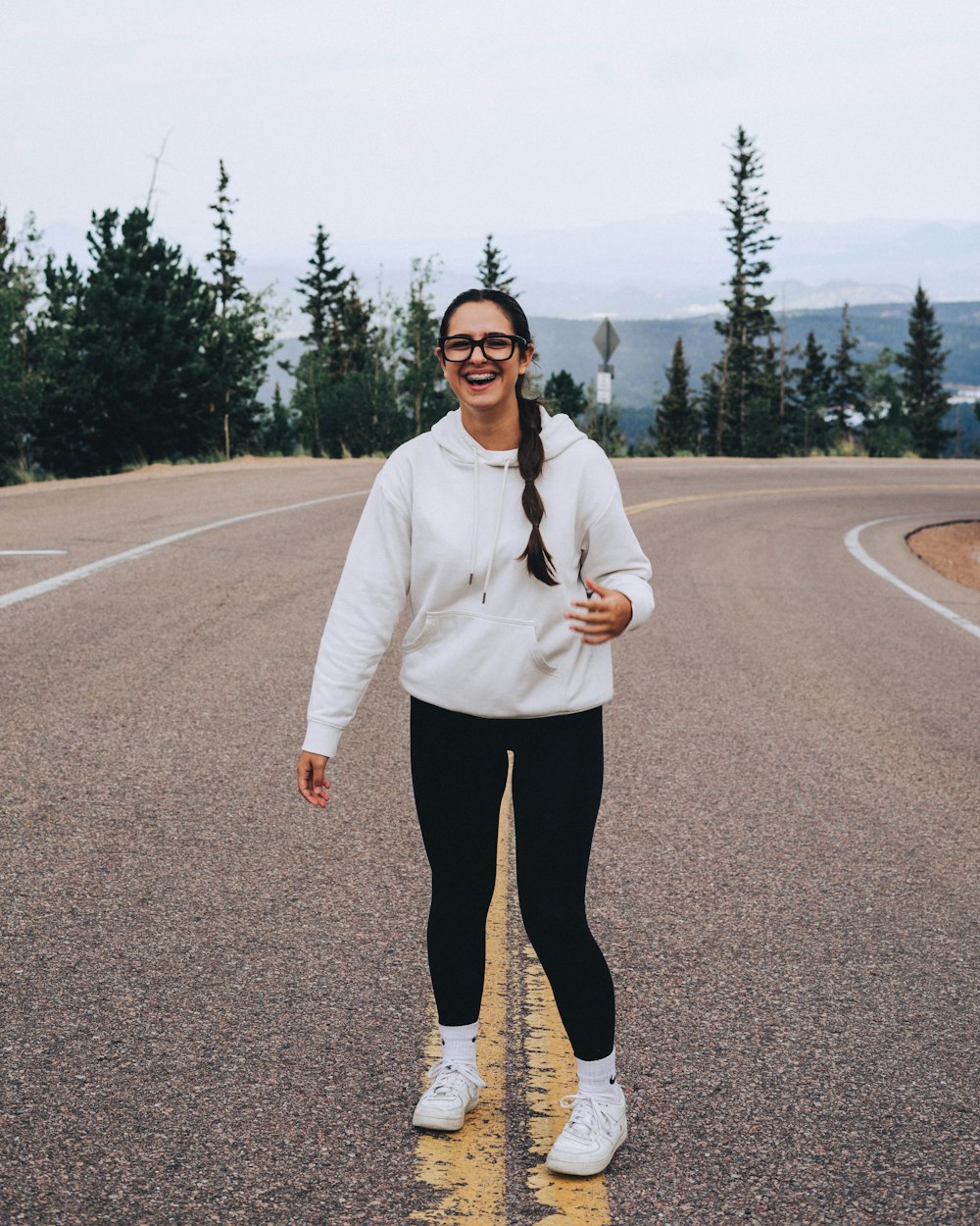 a person standing on a road