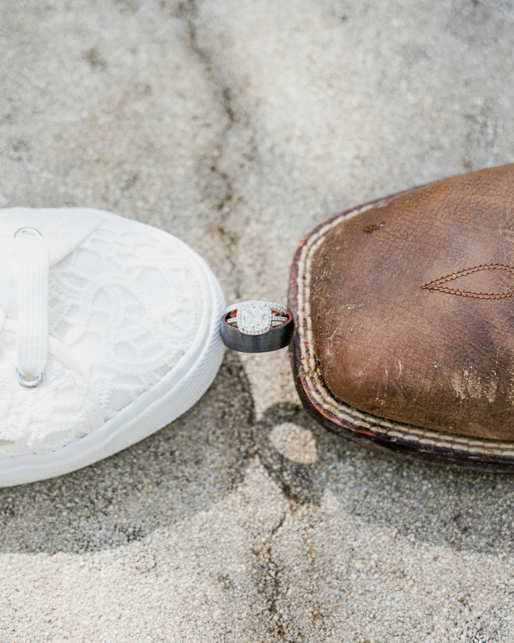 a white plate and a brown bowl on a stone surface