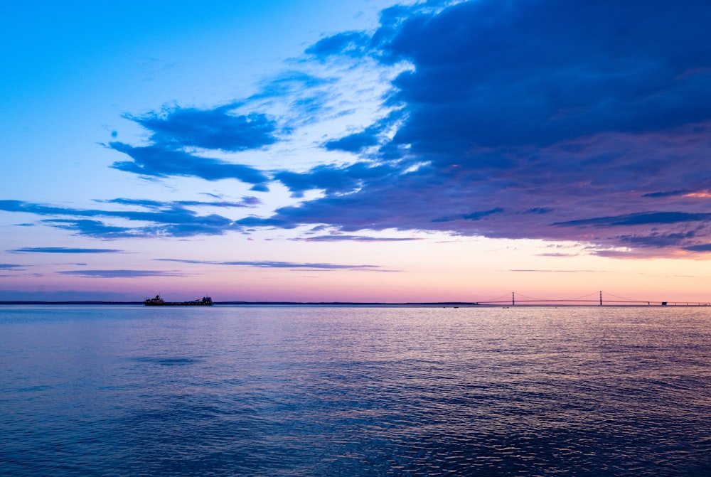 a body of water with a land in the distance