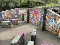 An outdoor space showcasing fresh paint on fences and walls.