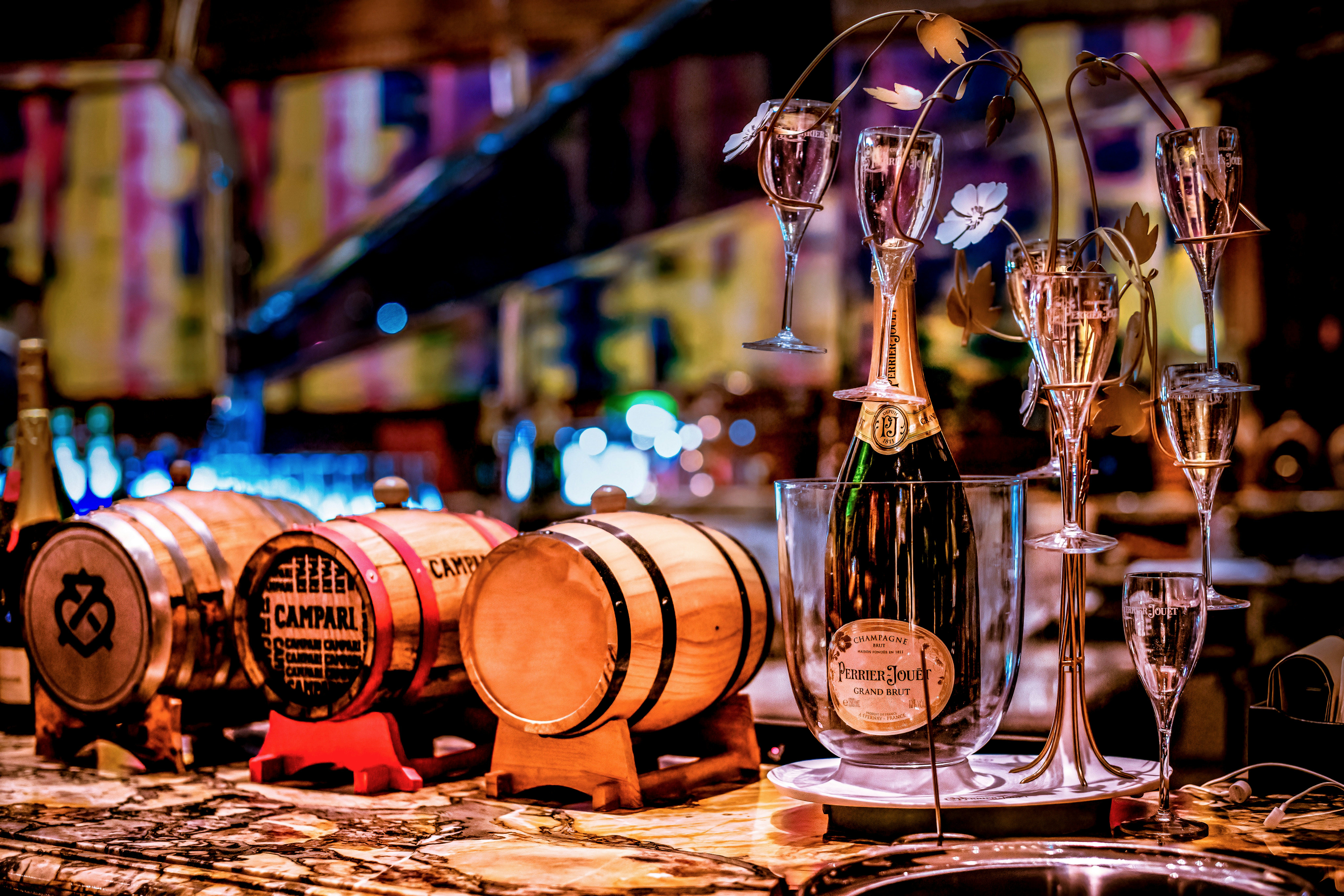 a group of wine glasses and bottles