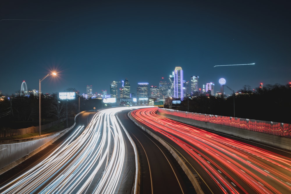 a highway with a city in the background