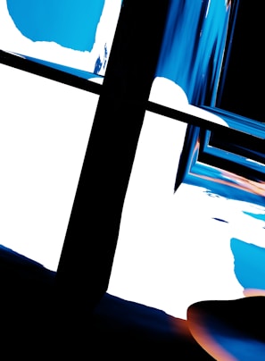 Abstract artwork combining afro-ukiyo-e motifs with modern tech elements in stark white and black contrast.