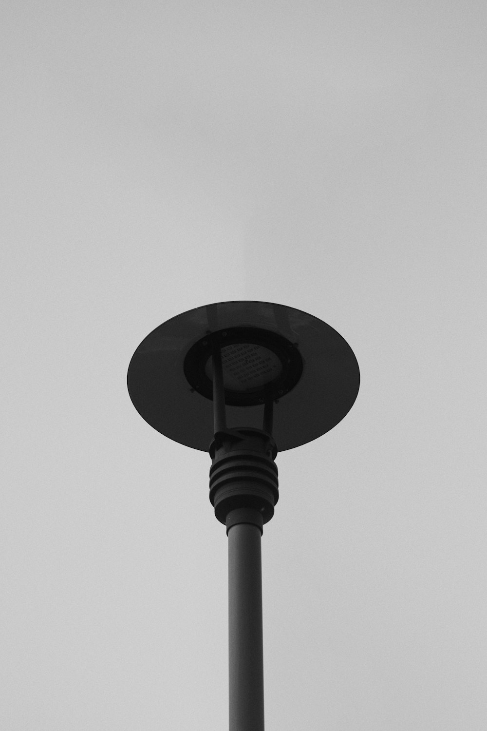 a black and white lamp post