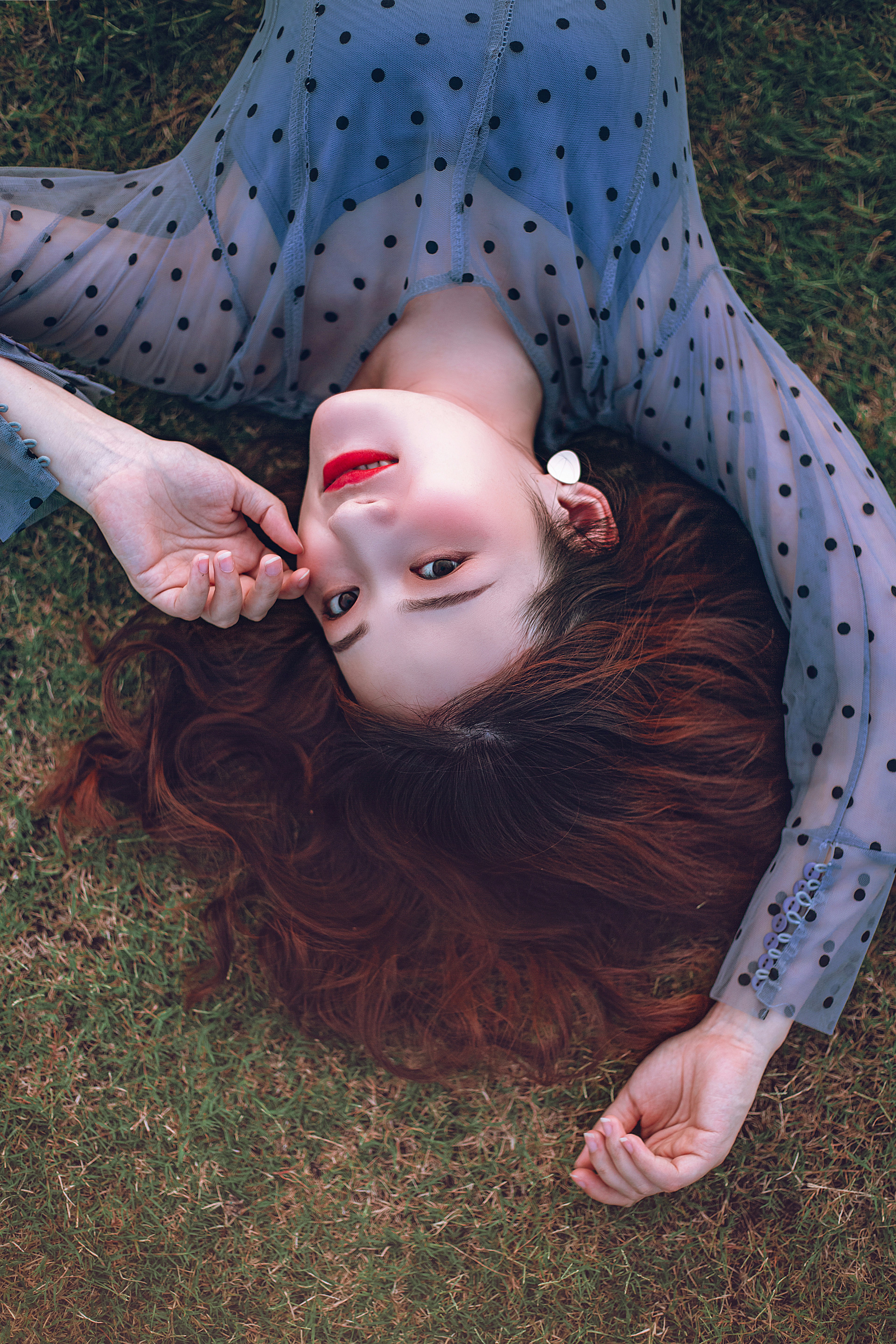 a person lying on the grass
