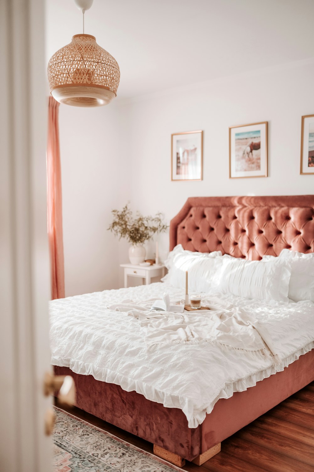 a bed with a white bed spread