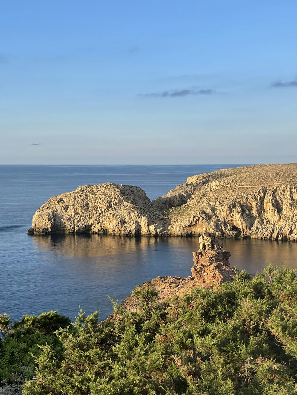 a rocky island surrounded by water