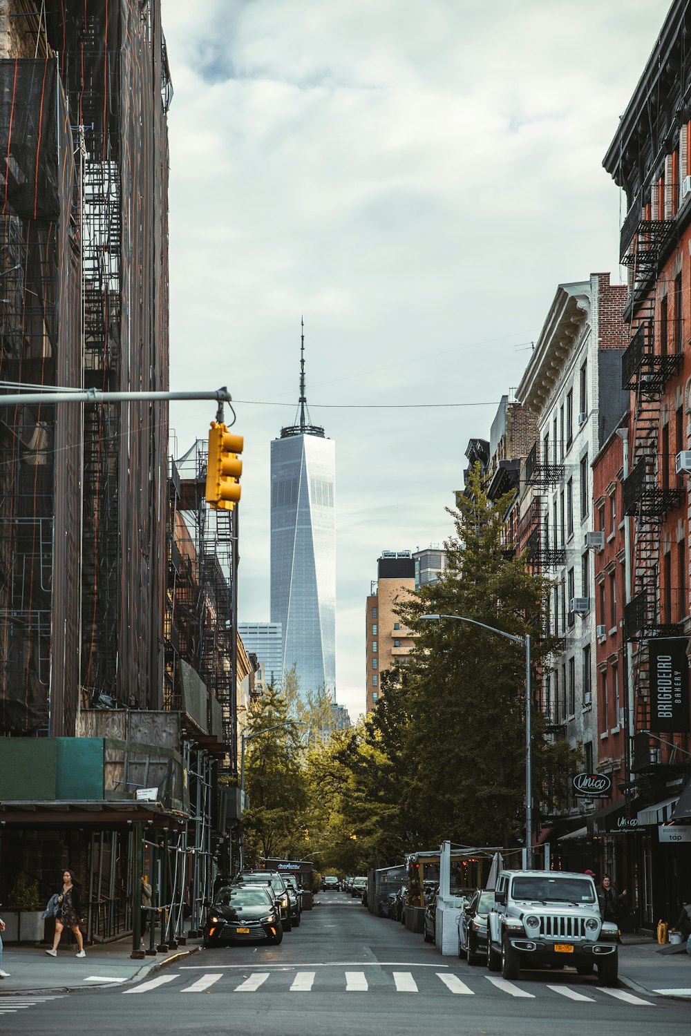 a city street with tall buildings