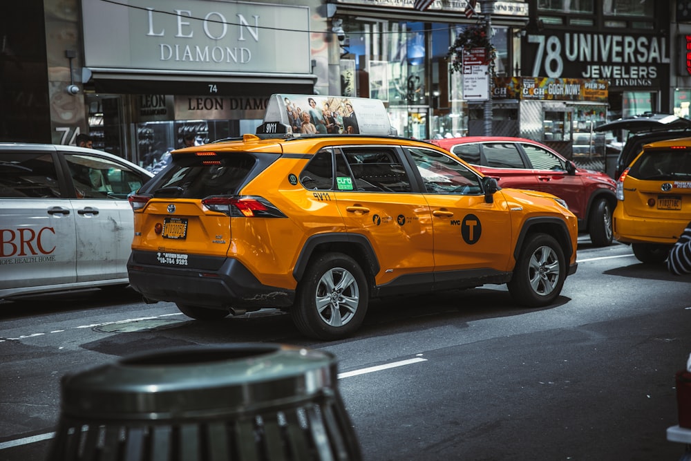 a group of cars parked on the side of a street