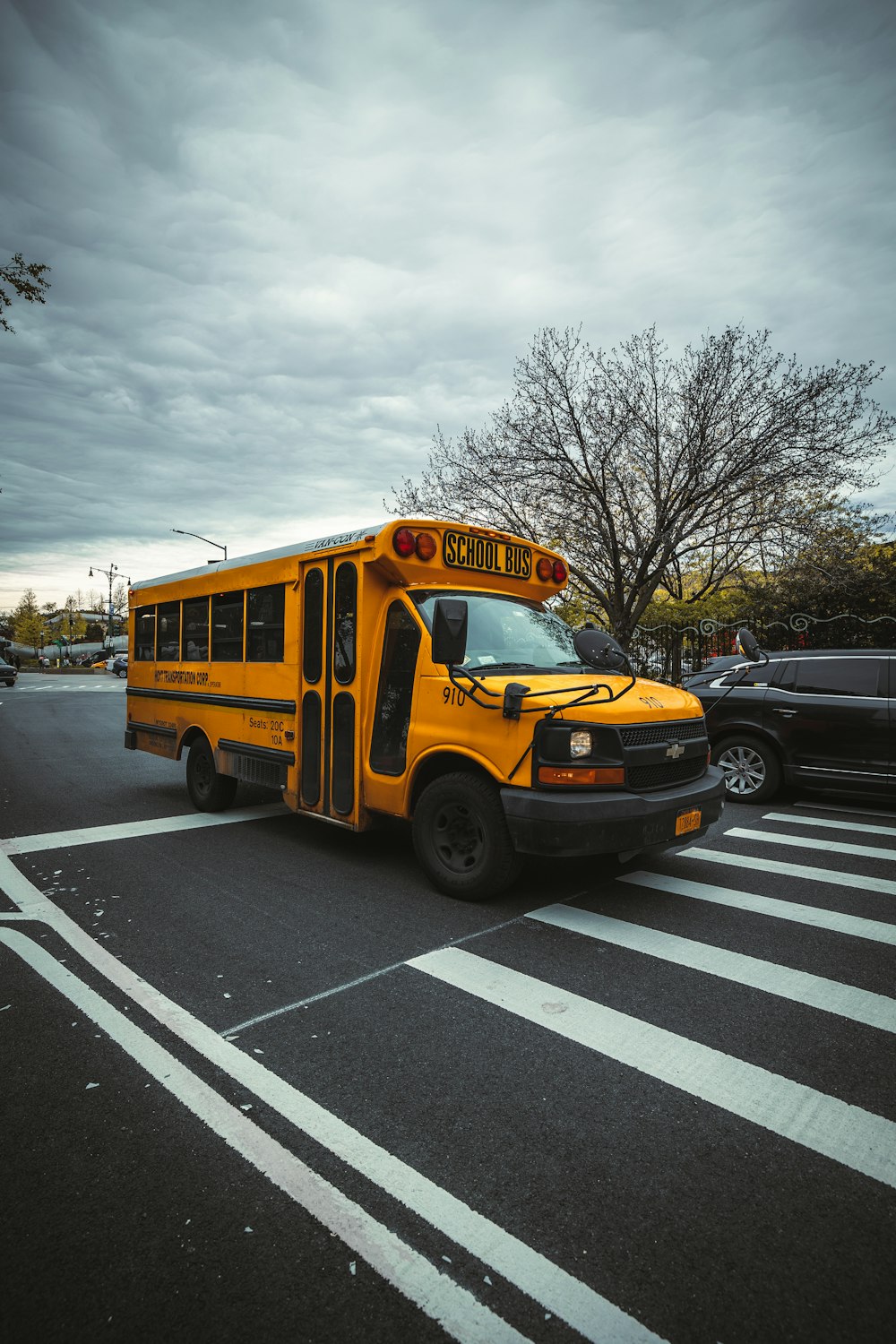 a yellow school bus parked in a parking lot