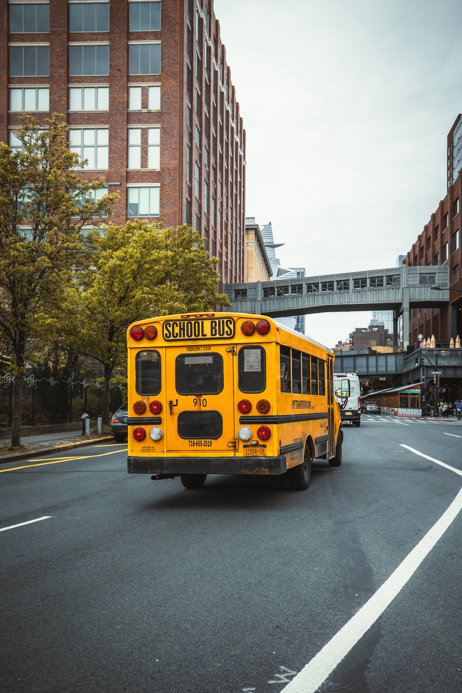 School bus leaving the campus at dispersal
