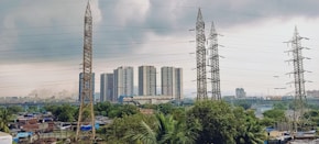 a group of power lines and towers