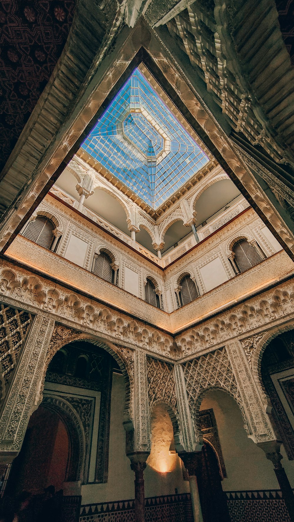 a large arched ceiling with a glass dome