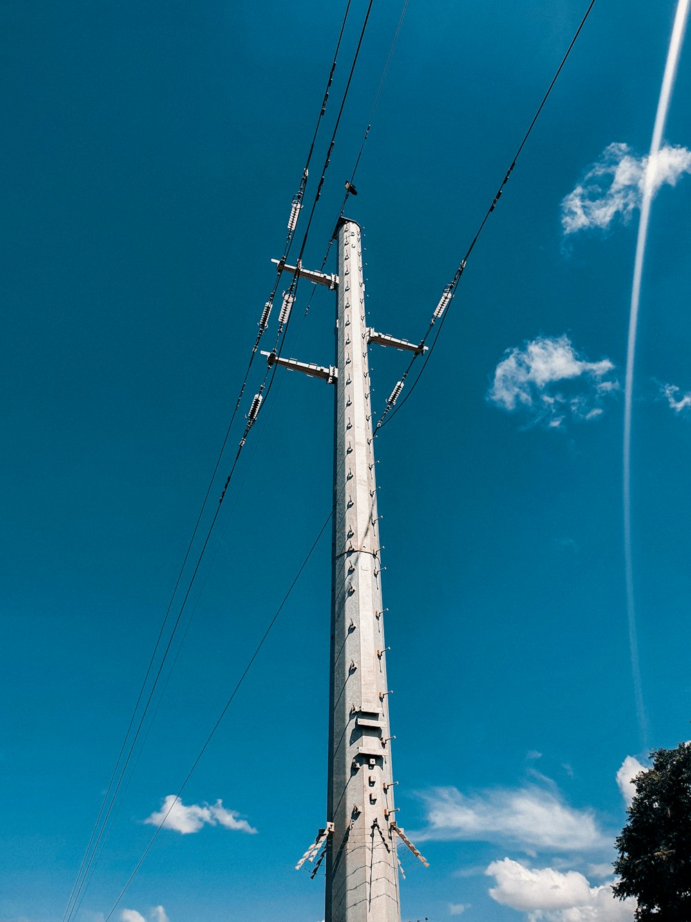 a tall tower with wires