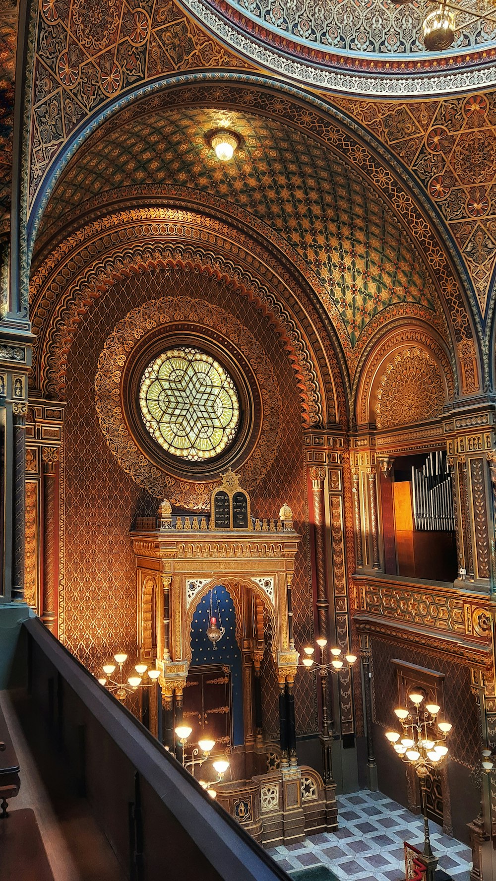 a large ornate room with a staircase