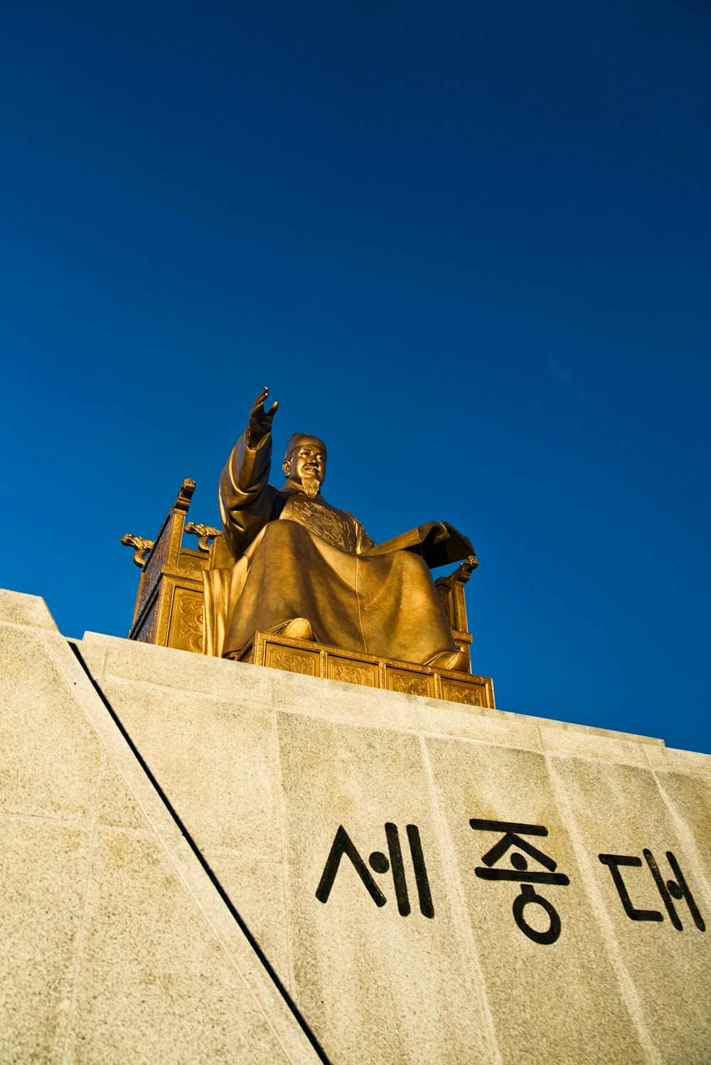 a statue of a person holding a torch