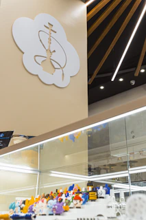 An elegant display case filled with premium quality figurines glowing under ambient light.