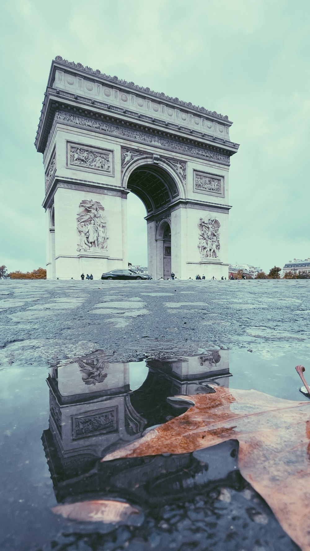 a stone archway over water