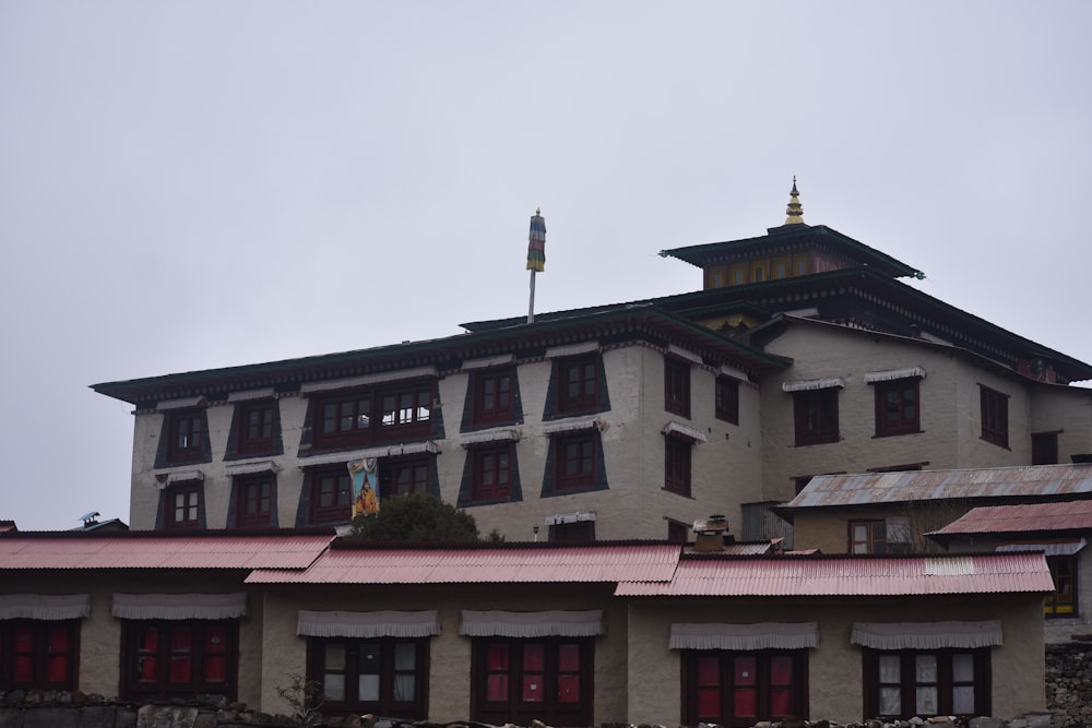 a building with a flag on top